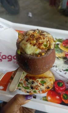 Pizza served in a clay pot